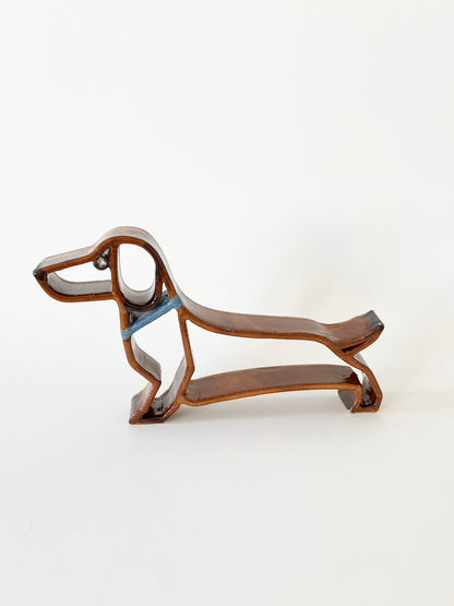 Sausage Dog with blue lead